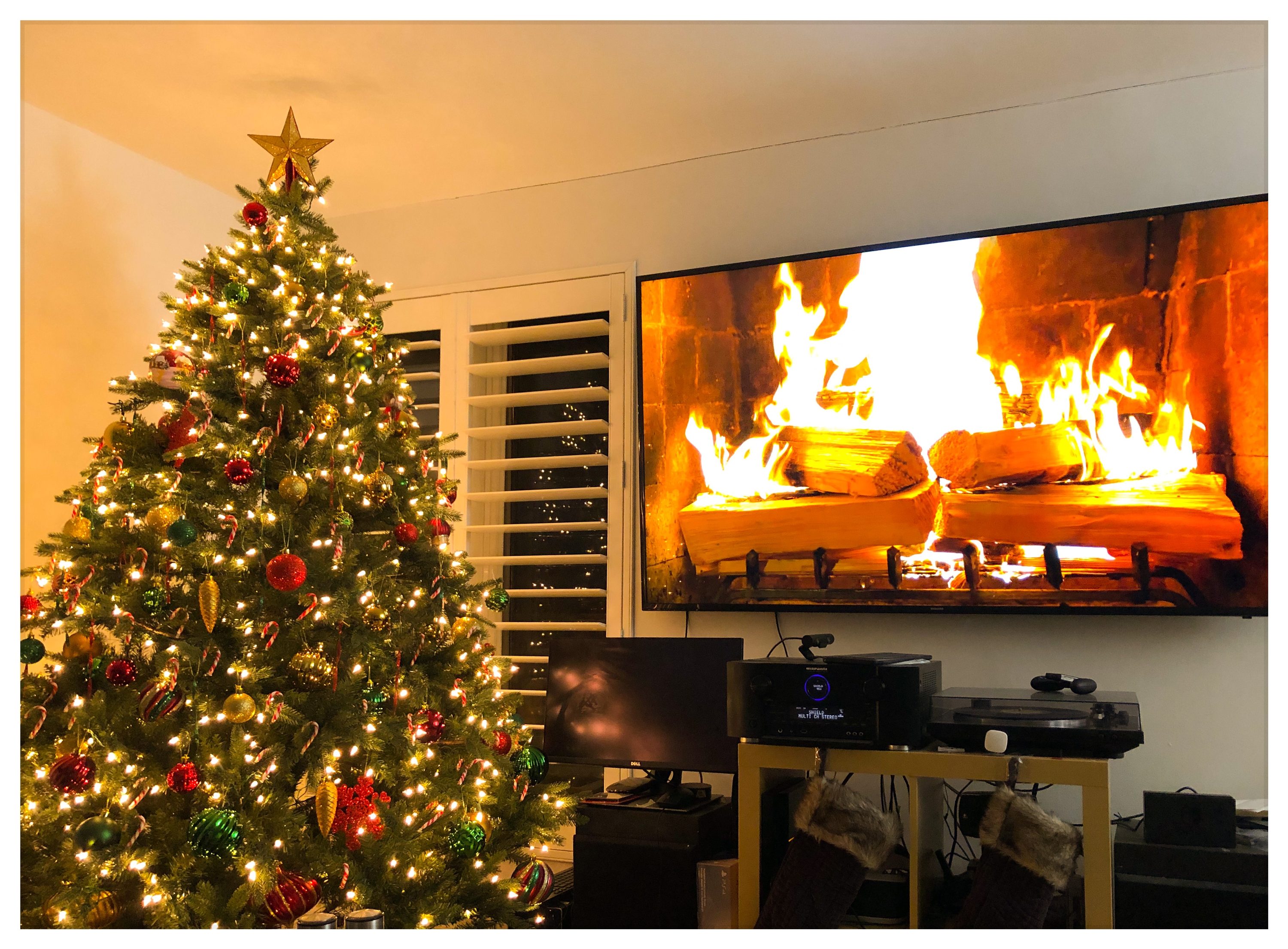 fully decorated and a 75 inch fire place